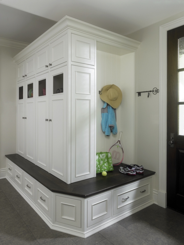 Custom White Mudroom Cubbies and Storage Bench