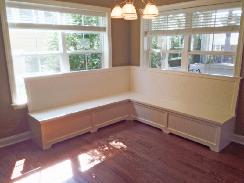 Custom White Window Seat Banquette with Storage