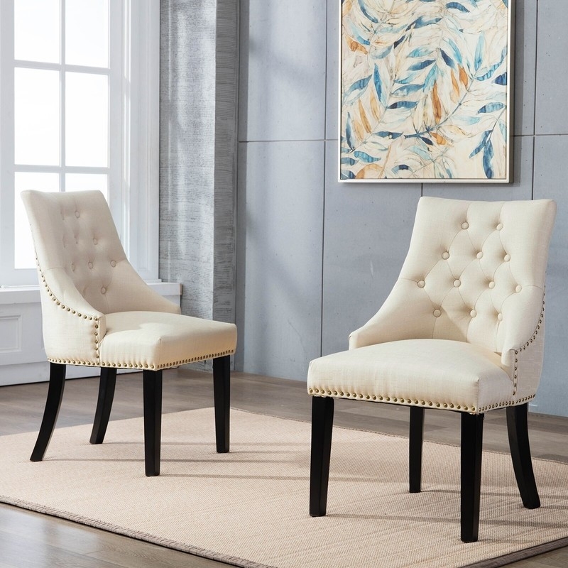 Elegant Beige Captain Chairs with Nailhead Trim