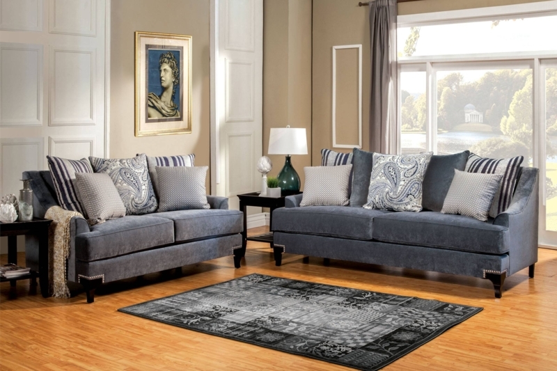 Elegant Blue Gray Sofas with Patterned Pillows