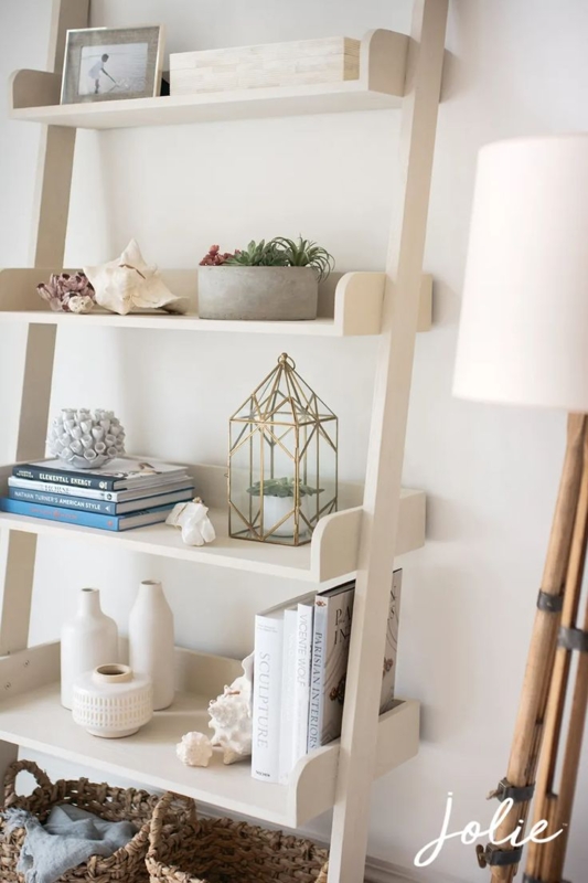 Elegant Coastal Shelving Unit Styled with Natural Decor