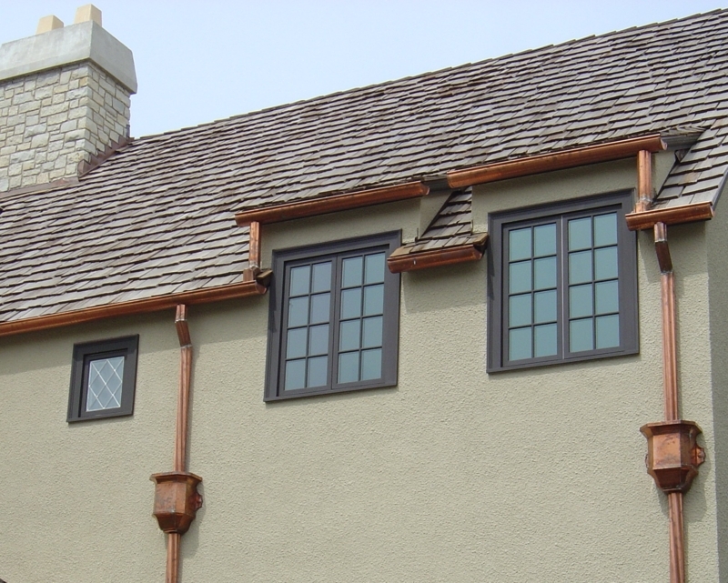 Elegant Copper Gutters and Classic Window Design