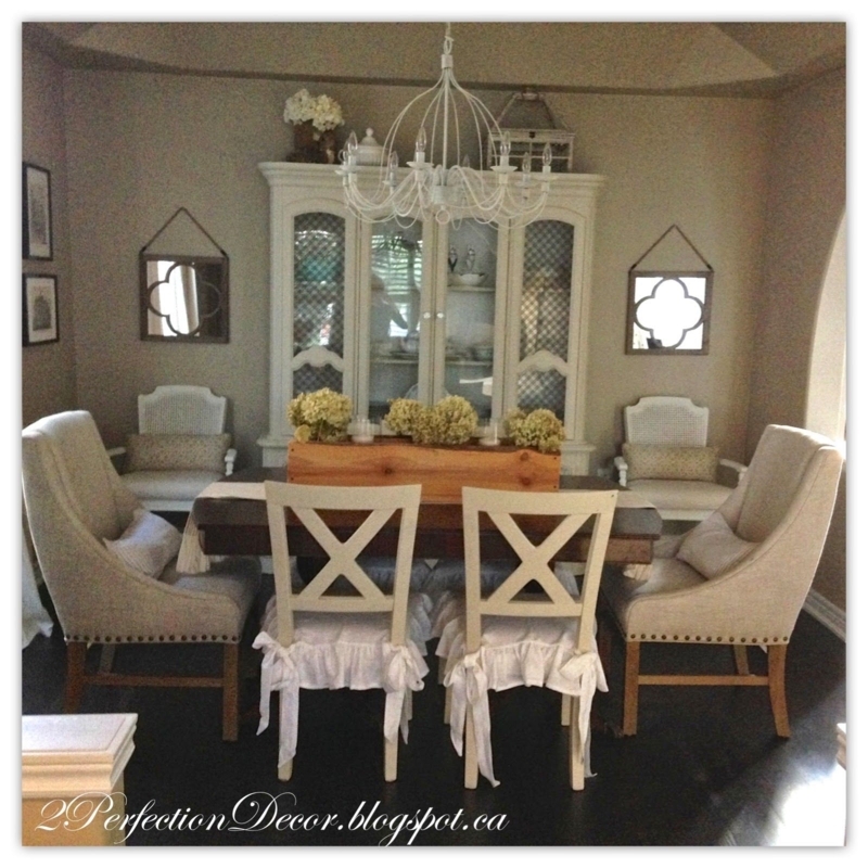 Elegant Dining Room with Classic Captains Chairs