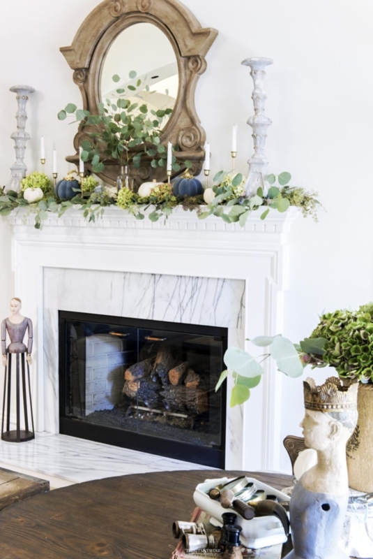 Elegant French Country Mirror Above Marble Fireplace