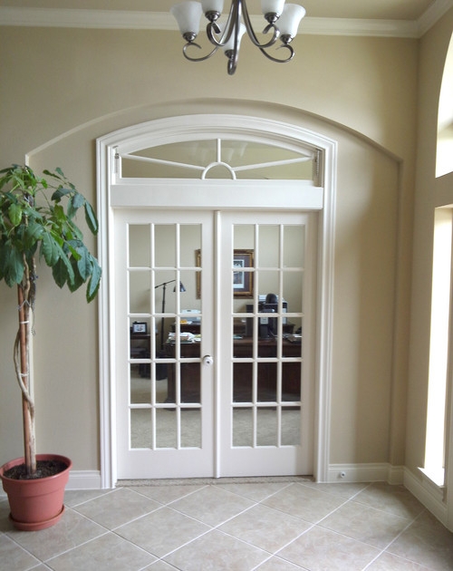 Elegant Interior French Doors with Decorative Transom