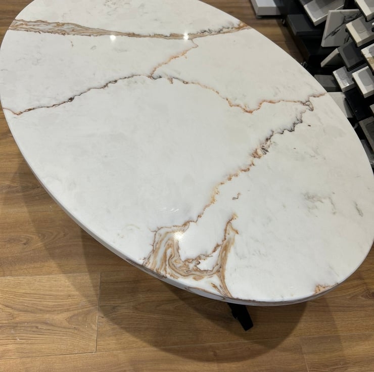 Elegant Oval Quartz Coffee Table with Natural Veining