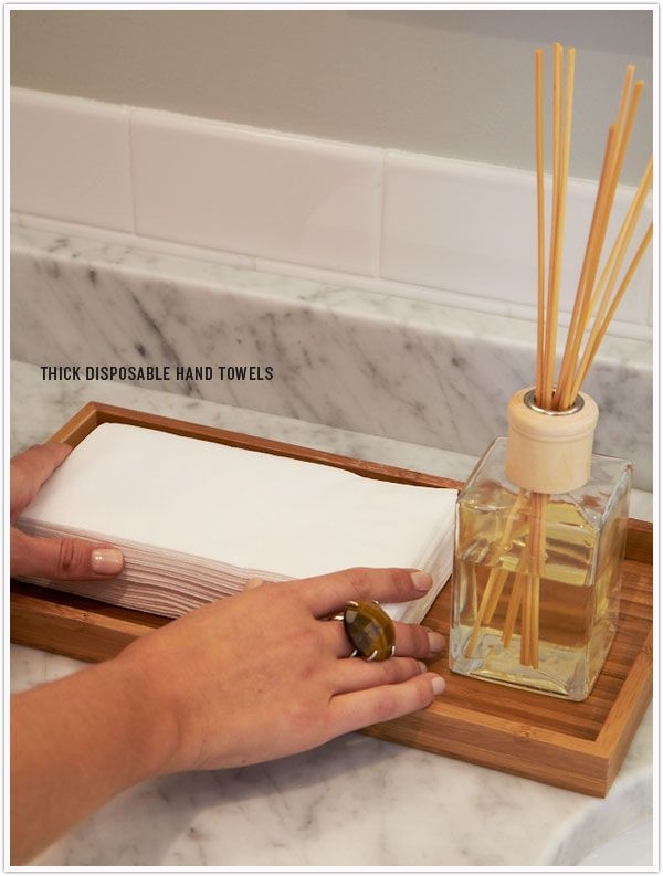 Elegant Powder Room with Disposable Towels and Diffuser