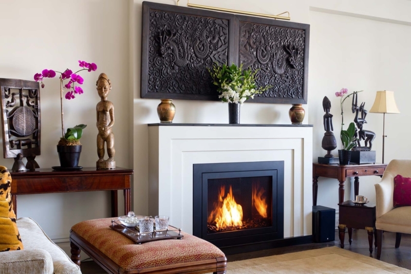 Elegant Tall Fireplace with Tribal Decor Accents