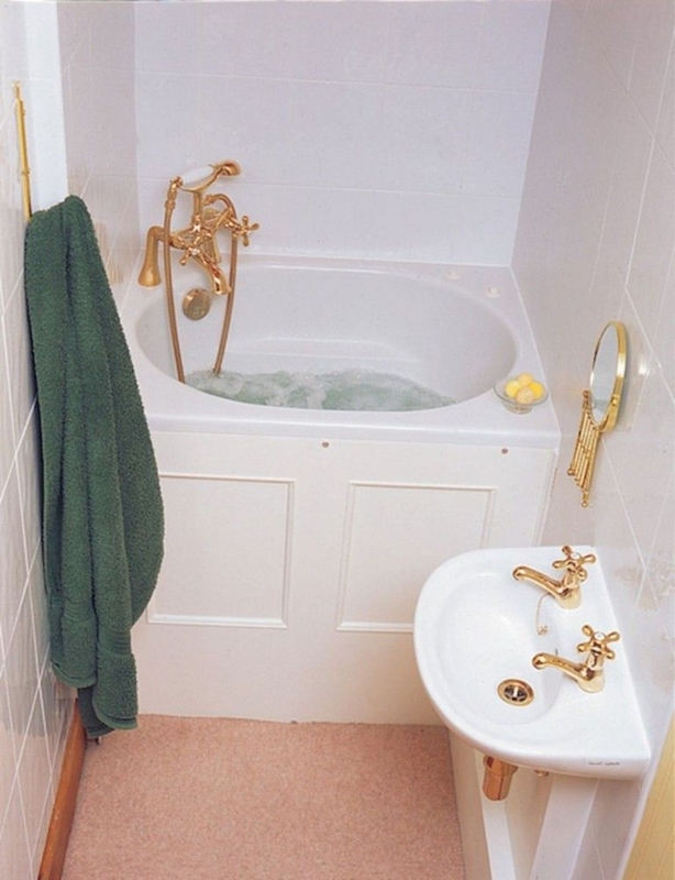 Elegant Tiny Bathroom with Gold Fixtures