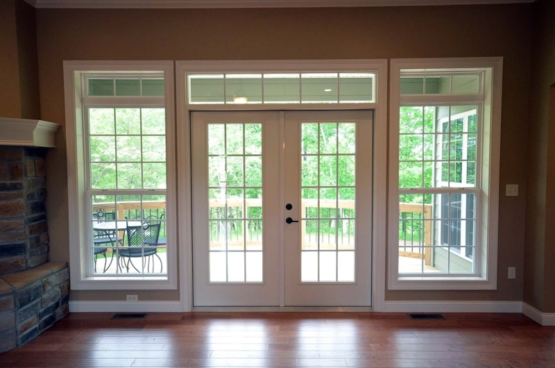 Elegant White French Doors with Transom Windows