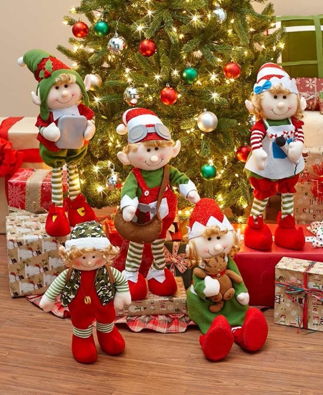 Festive Holiday Elf Decorations by Christmas Tree