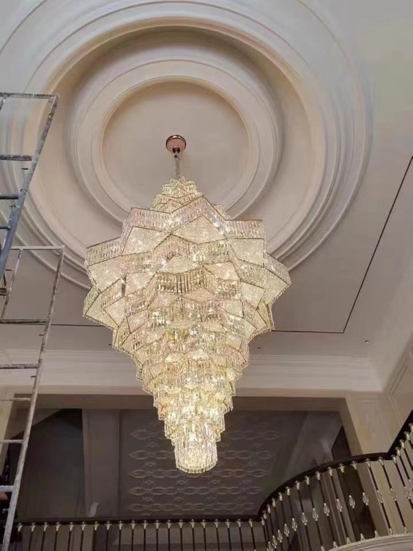 Grand Crystal Chandelier with Ornate Ceiling Detail