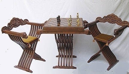 Intricately Carved Wooden Chess Table and Chairs