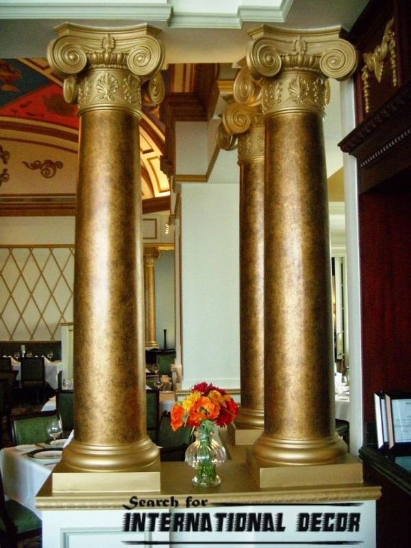 Luxurious Gold Corinthian Columns in Elegant Interior