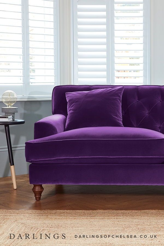 Luxurious Purple Velvet Sofa in Contemporary Living Room