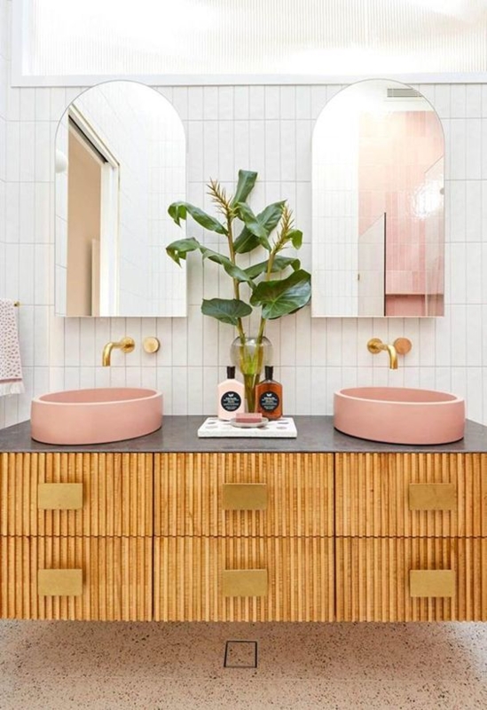 Modern Bathroom with Fluted Wood Vanity and Pink Sinks
