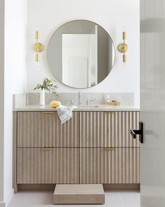 Modern Bathroom with Fluted Wood Vanity and Round Mirror
