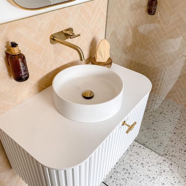 Modern Fluted White Bathroom Vanity with Gold Fixtures