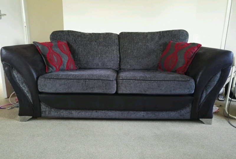 Modern Gray and Black Two-Seater Sofa with Red Cushions