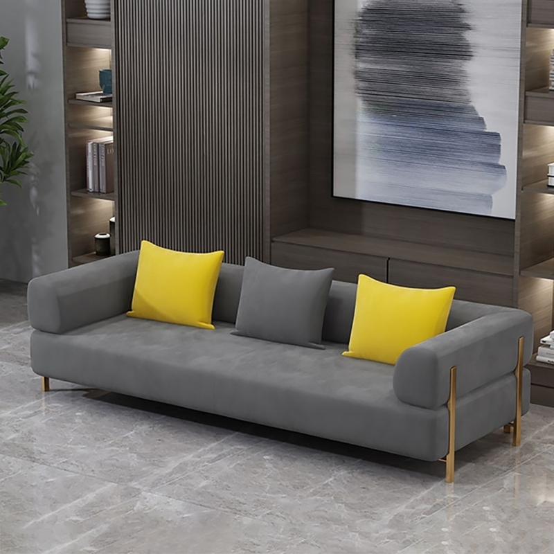 Modern Gray Velvet Sofa with Gold Legs and Yellow Pillows