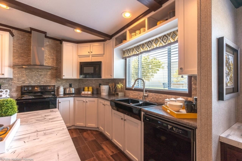 Modern Kitchen with Black Appliances and White Cabinets