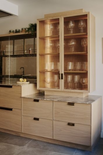 Modern Kitchen with Fluted Glass Cabinets