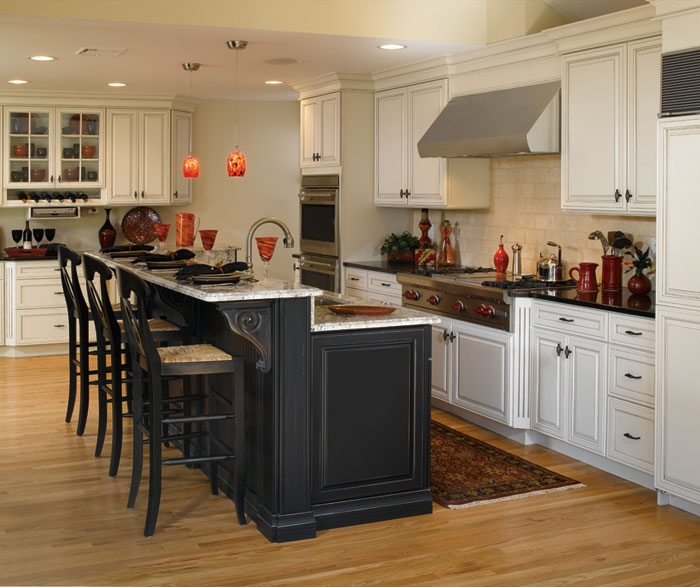 Modern Kitchen with Off White Cabinets and Black Island