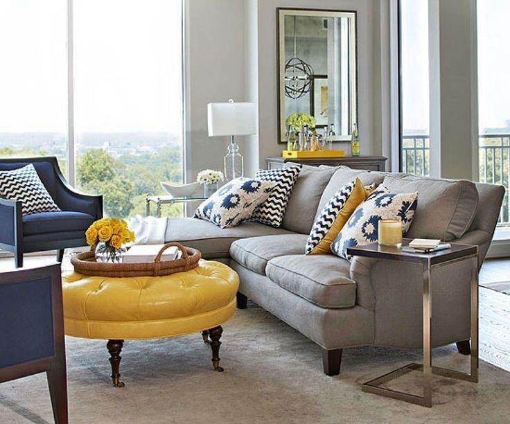 Modern Living Room with Blue Gray Sofas and Yellow Accents