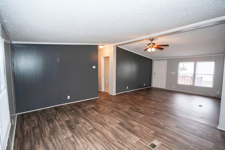 Modern Mobile Home Interior with Dark Wall Paneling