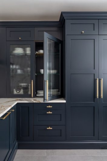 Modern Navy Kitchen with Fluted Glass Cabinets