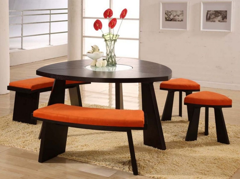 Modern Triangle Dining Table with Orange Cushions