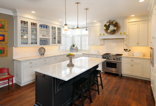 Modern White Kitchen with Black Island and Hardwood Floors