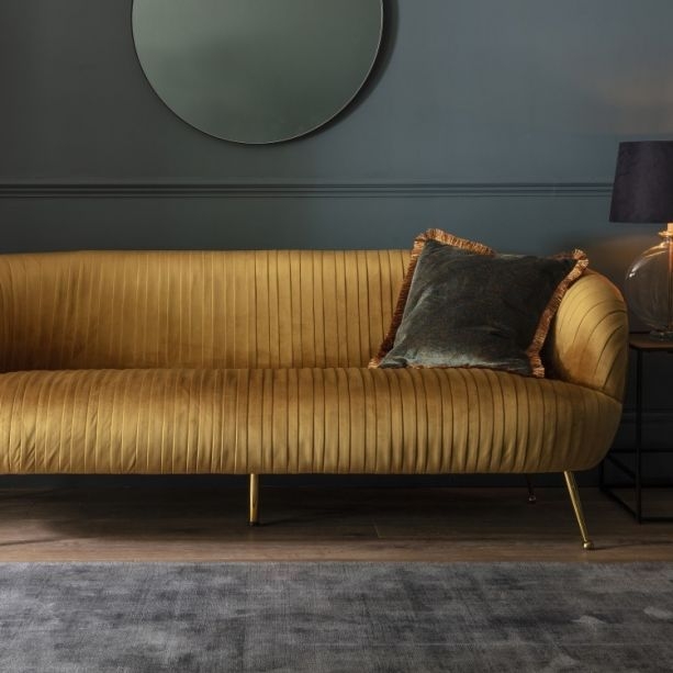 Modern Yellow Velvet Couch with Dark Accent Wall