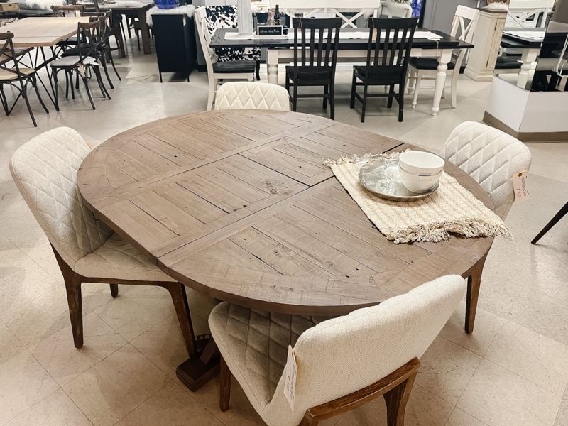 Round Driftwood Dining Table with Upholstered Chairs