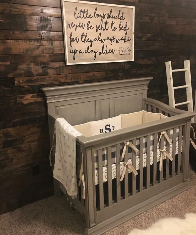 Rustic Gray Wooden Baby Crib with Wall Art