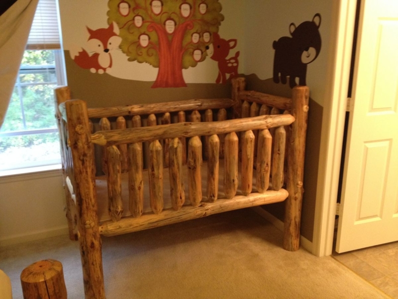 Rustic Log Baby Crib in Woodland Nursery