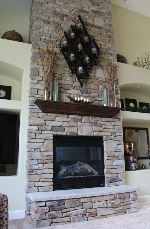 Rustic Tall Stone Fireplace with Decorative Mantel