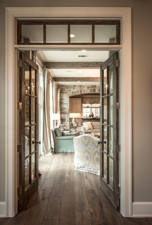 Rustic Transom Window Above French Wood Doors