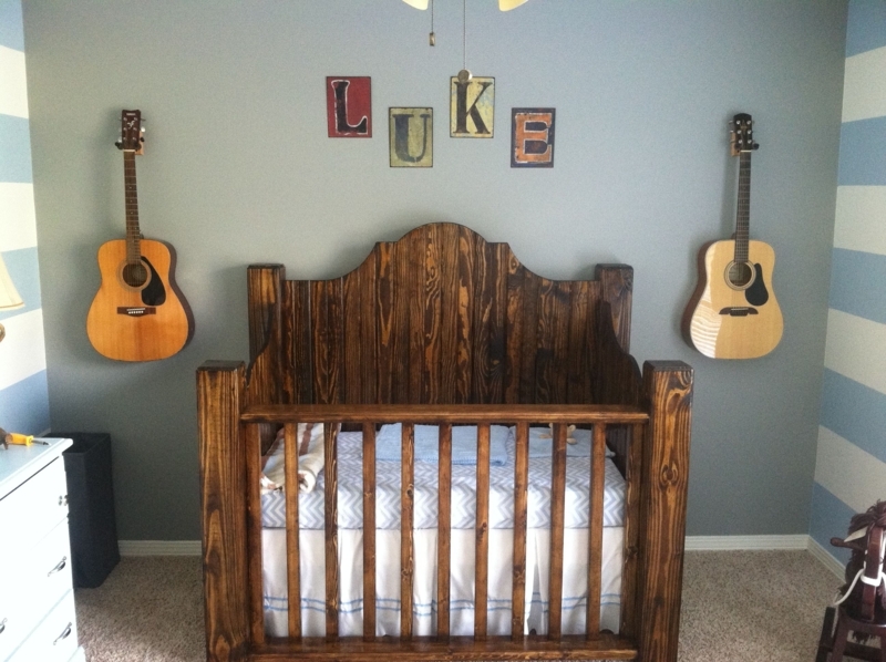 Rustic Wooden Baby Crib with Musical Decor
