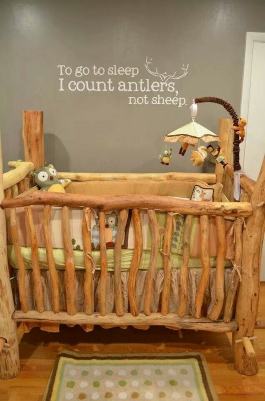 Rustic Wooden Baby Crib with Nature-Inspired Decor