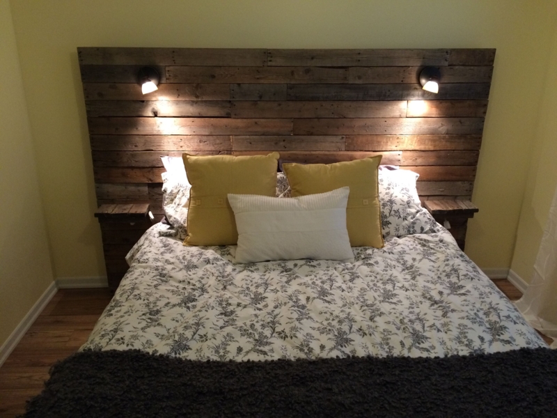 Rustic Wooden Headboard with Warm Accent Lighting