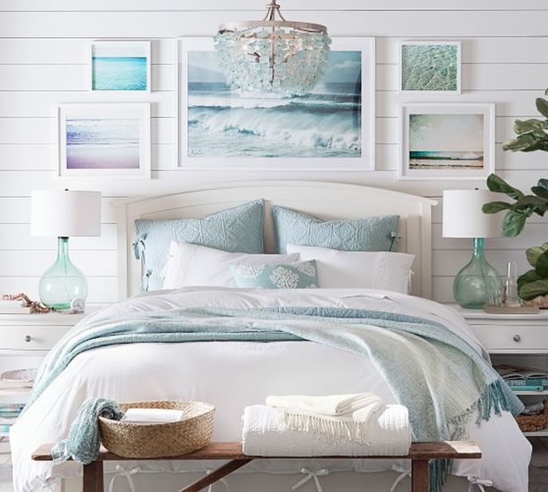 Serene Coastal Bedroom with Ocean Art Decor