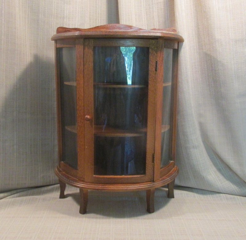 Small Rounded Glass Front Tiger Oak Curio Cabinet