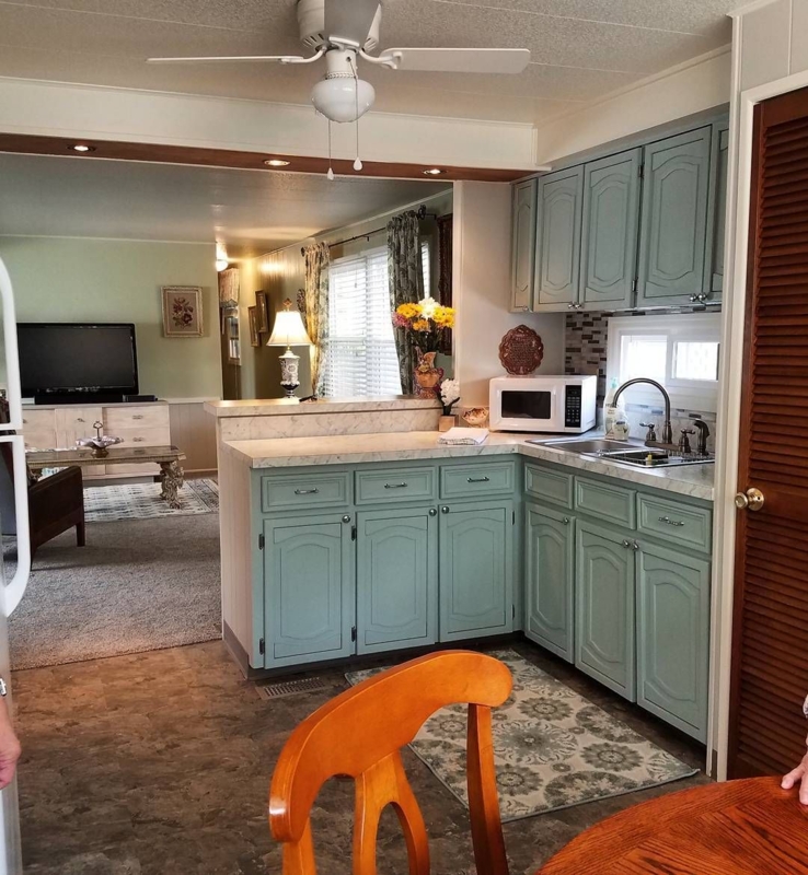 Soft Blue Kitchen Cabinets with Natural Light
