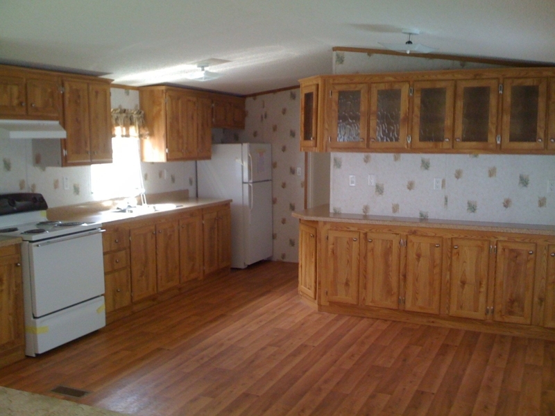 Spacious Rustic Mobile Home Kitchen with Wooden Cabinets