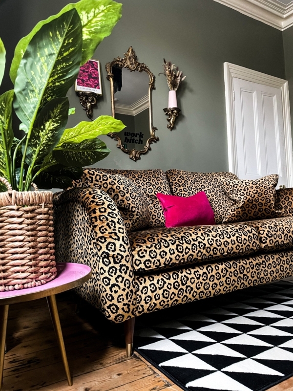 Stylish Leopard Print Sofa with Vibrant Accent Pillow