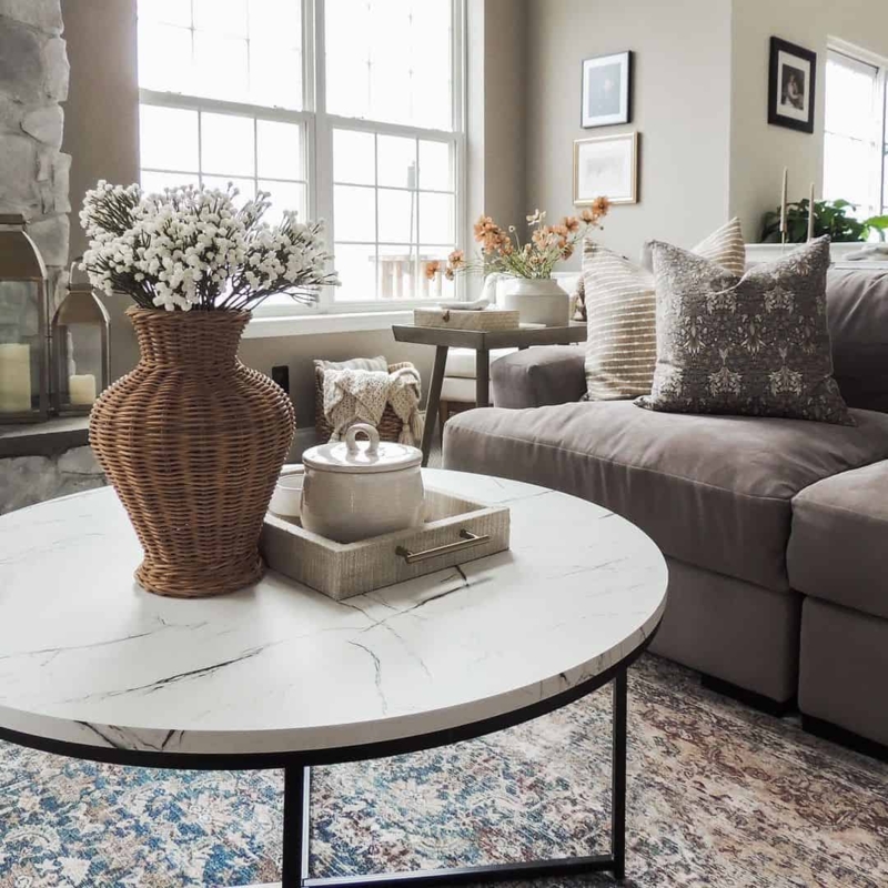 White Quartz Coffee Table with Wicker Vase Decor