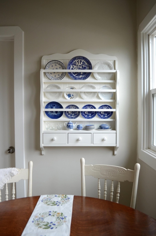 White Wooden Wall Plate Rack with Blue and White Dishes