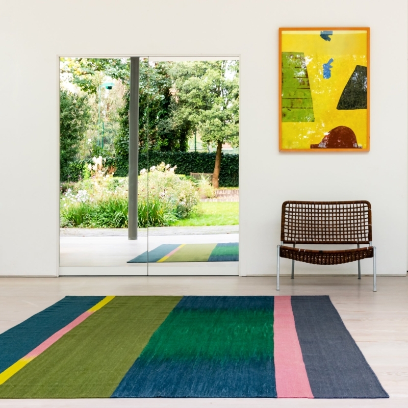 Asymmetrical Olive Green Flatweave Rug Design