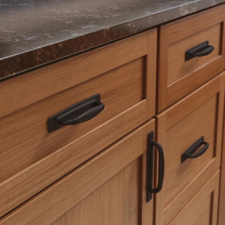 Black Cup Drawer Pulls on Oak Kitchen Cabinets